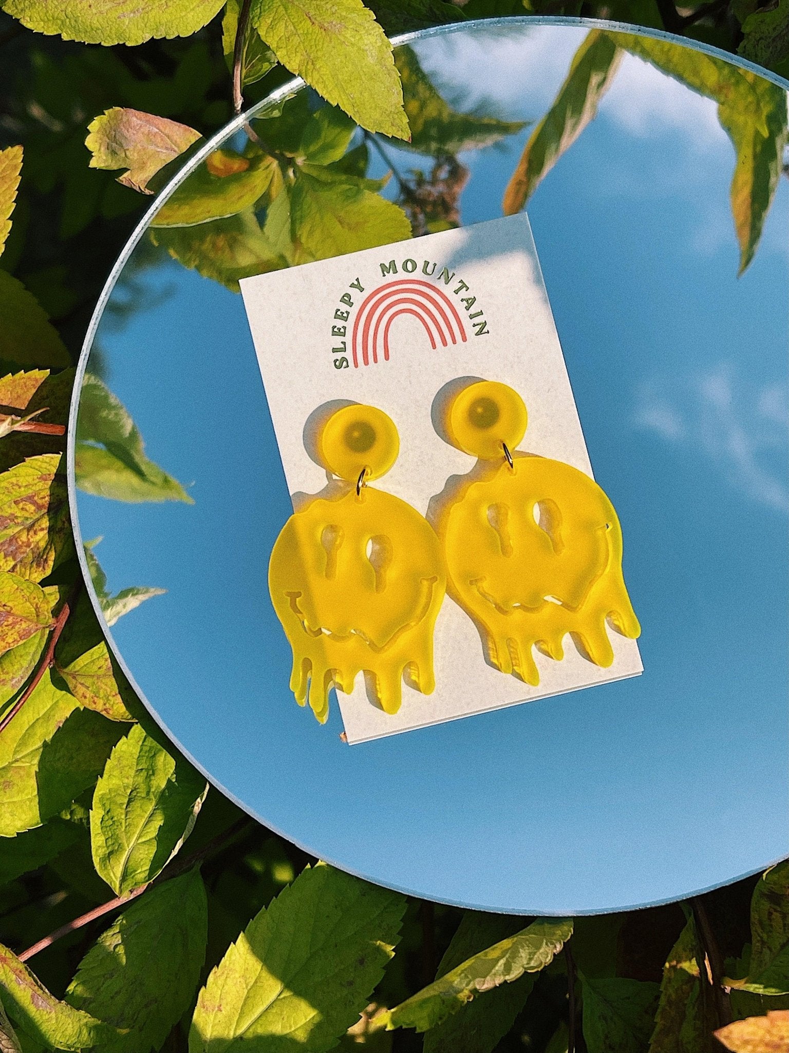 Melted Smiley Face Dangle Earrings - Sleepy Mountain