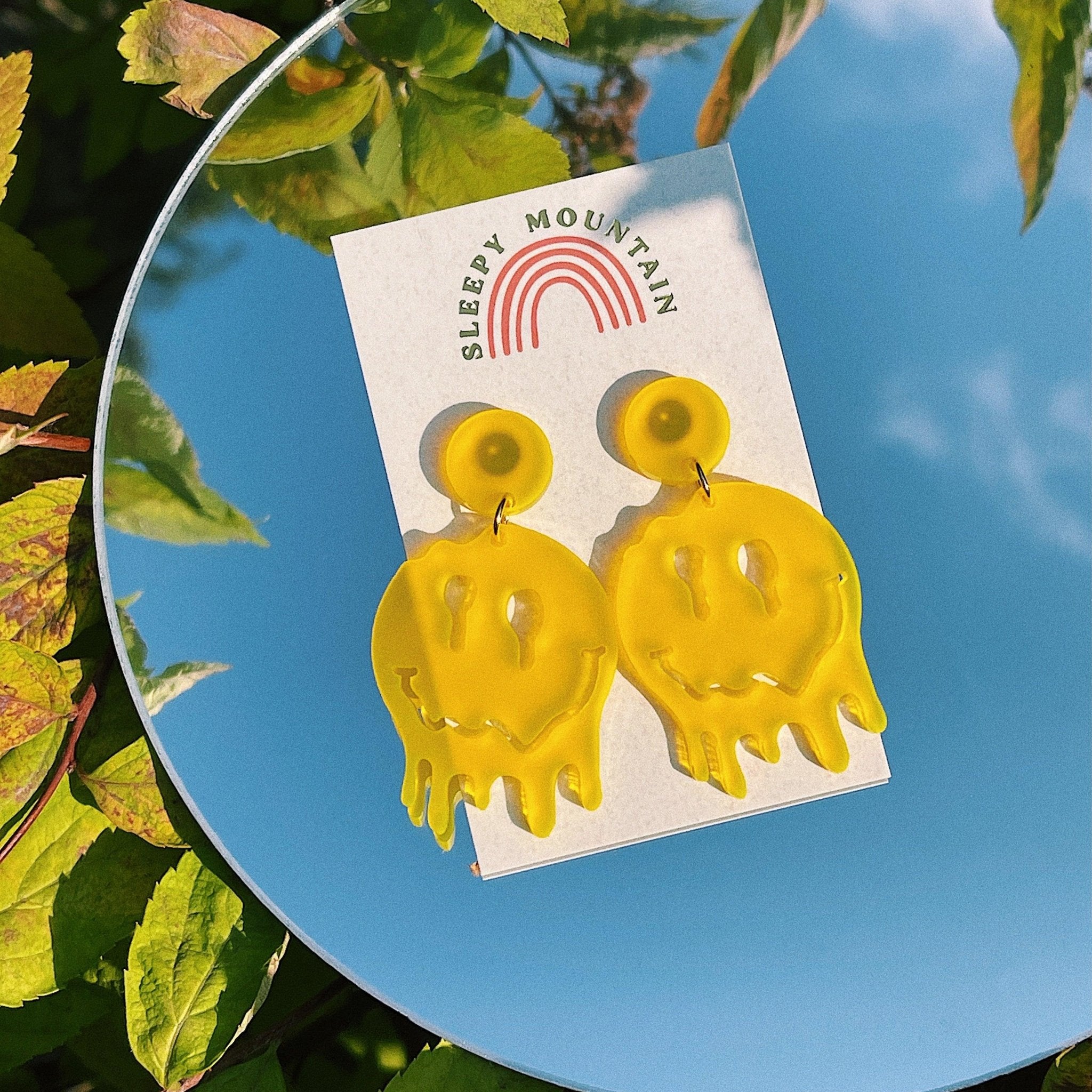 Melted Smiley Face Dangle Earrings - Sleepy Mountain
