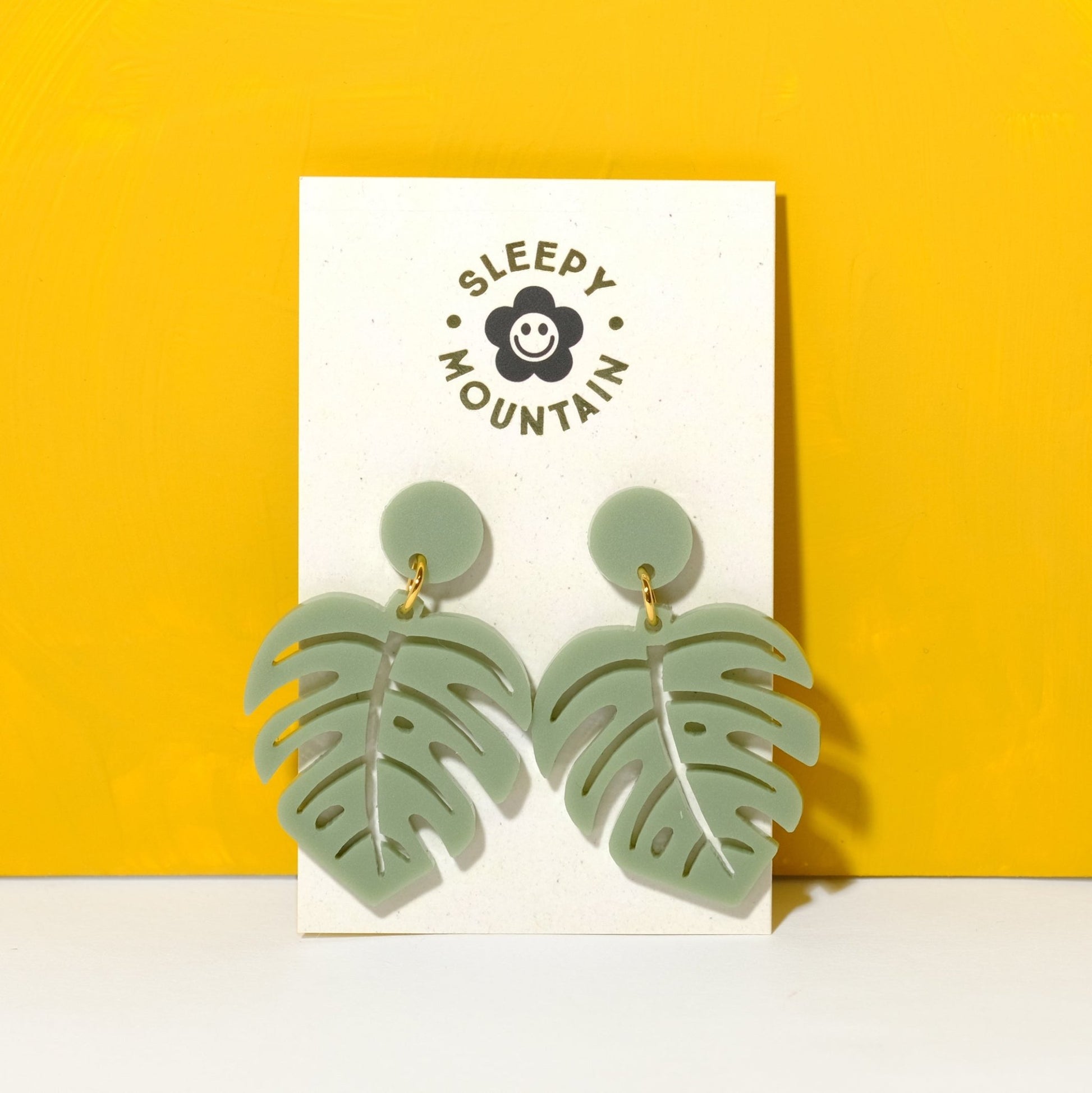 Monstera dangle earrings in sage green - Sleepy Mountain