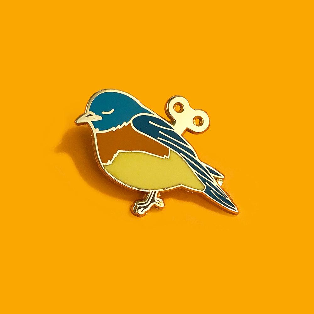 Wind-Up Bird Enamel Pin - Sleepy Mountain